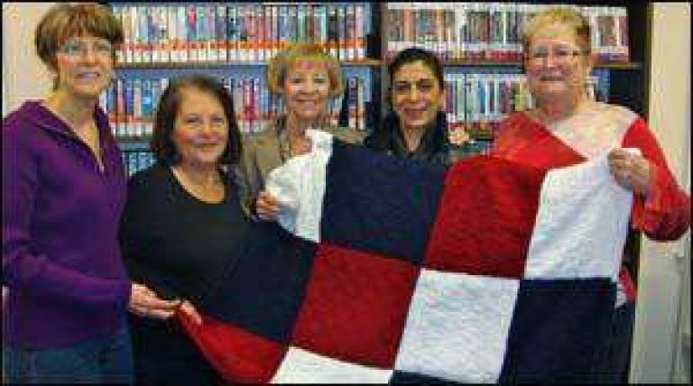 Knitters stitch together comfort for soldiers