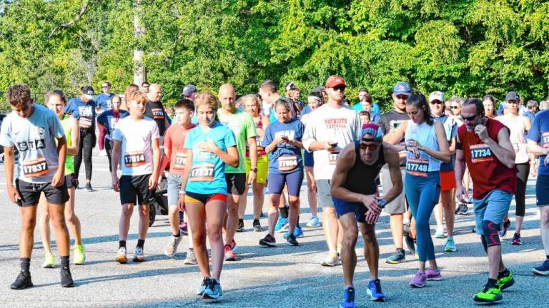 Runners prepare for the start of the Lenape Valley 50th Anniversary 5K on Saturday, Sept. 14 at the high school in Stanhope. (Photos by Maria Kovic)