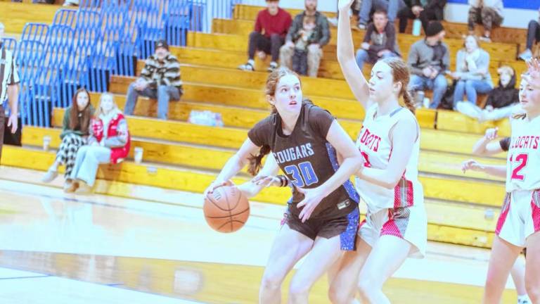 KT1 Kittatinny’s Lina Hull handles the ball in the game against High Point on Jan. 4. Kittatinny won, 37-29. (Photos by George Leroy Hunter)