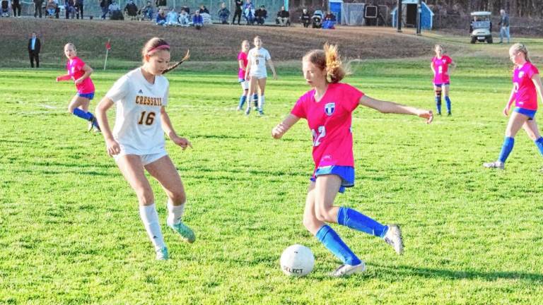 Kittatinny's Eleanor Deckert controls the ball as Cresskill's Ariel Alejo tries to keep pace in the semifinal round of the NJSIAA North Jersey, Section 1, Group 1 tournament Monday, Nov. 11. The Cougars won, 3-0, and Deckert scored one goal. (Photos by George Leroy Hunter)